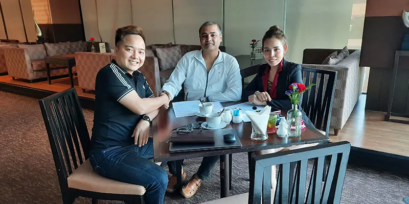 V3Cube team attending business meetings in Thailand