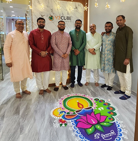 V3Cube team members working in a collaborative office environment that promotes innovation, teamwork, and professional growth